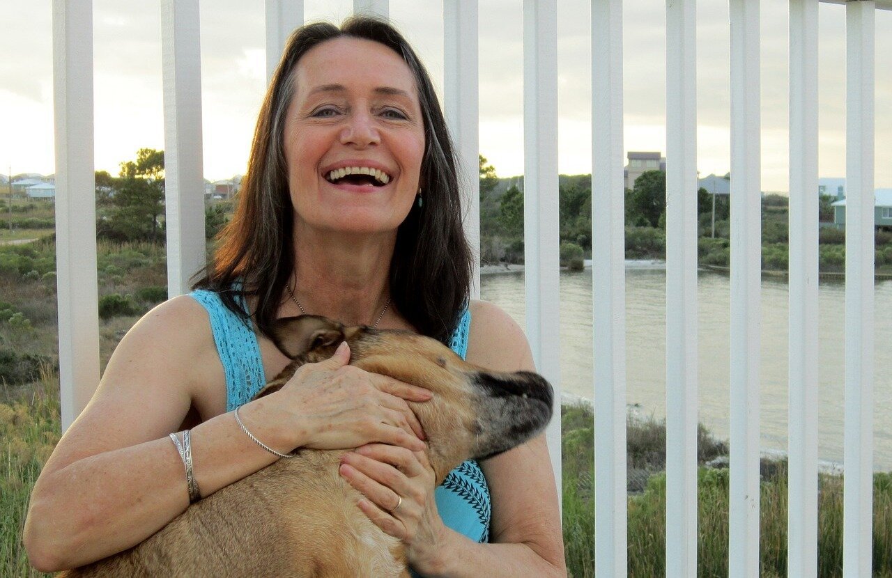 woman with dog volunteering in retirement